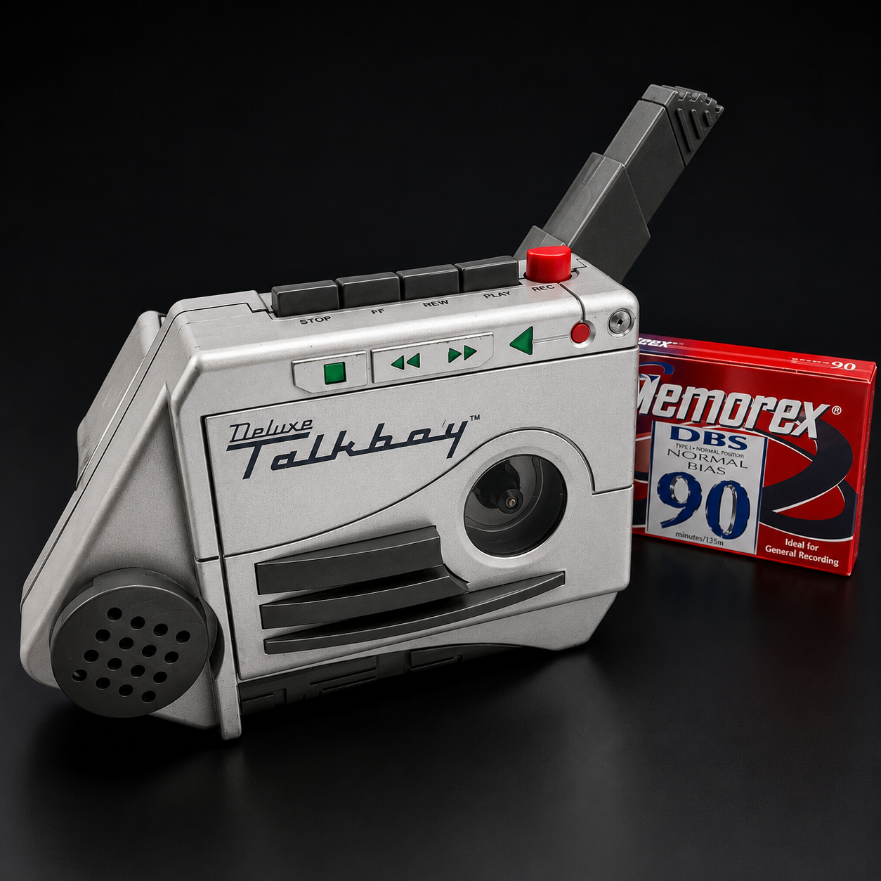 Talkboy cassette recorder with a red cassette nearby